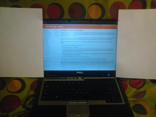Paper on each side of the screen to create whitespace